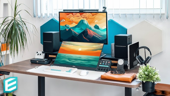 modern computer setups with code and design screens