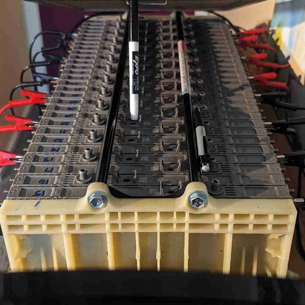 Professional equipment used for capacity testing and reconditioning of hybrid battery modules.