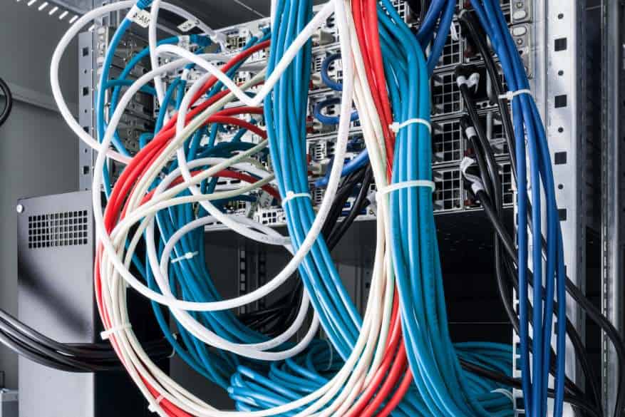 physical server rack with network cables