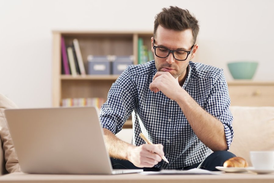 Person focused on a laptop in a calm environment