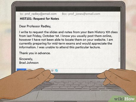 Italian formal email document on desk