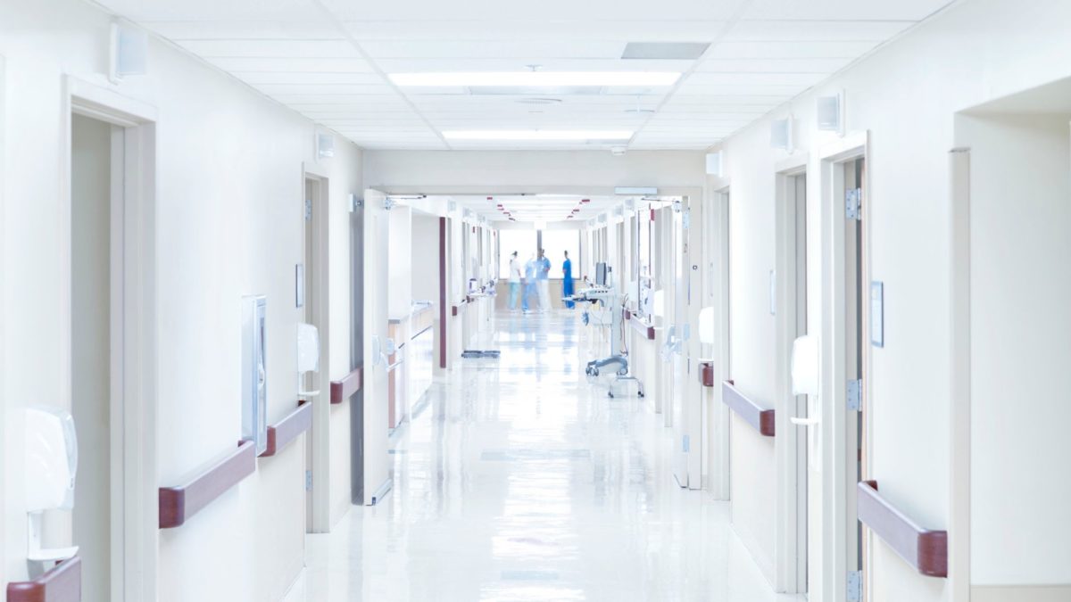 modern hospital corridor with digital screens