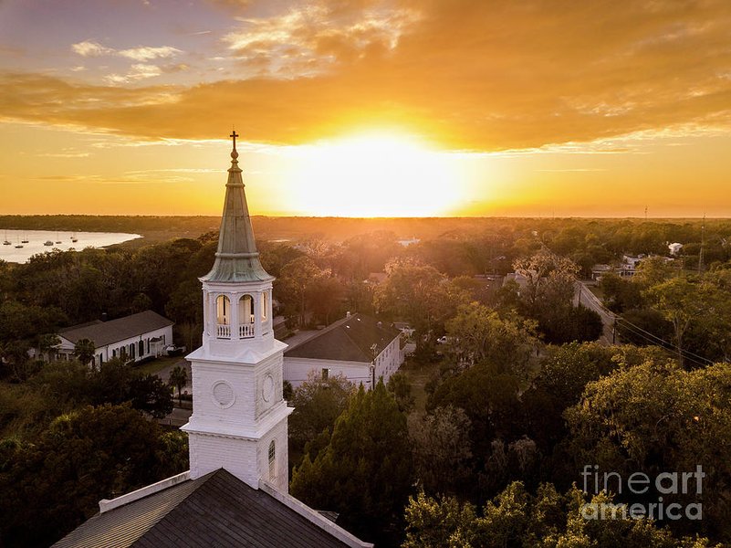 sunset over church steeple