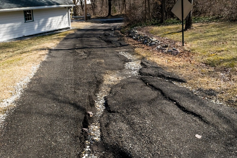 home driveway in storm damage