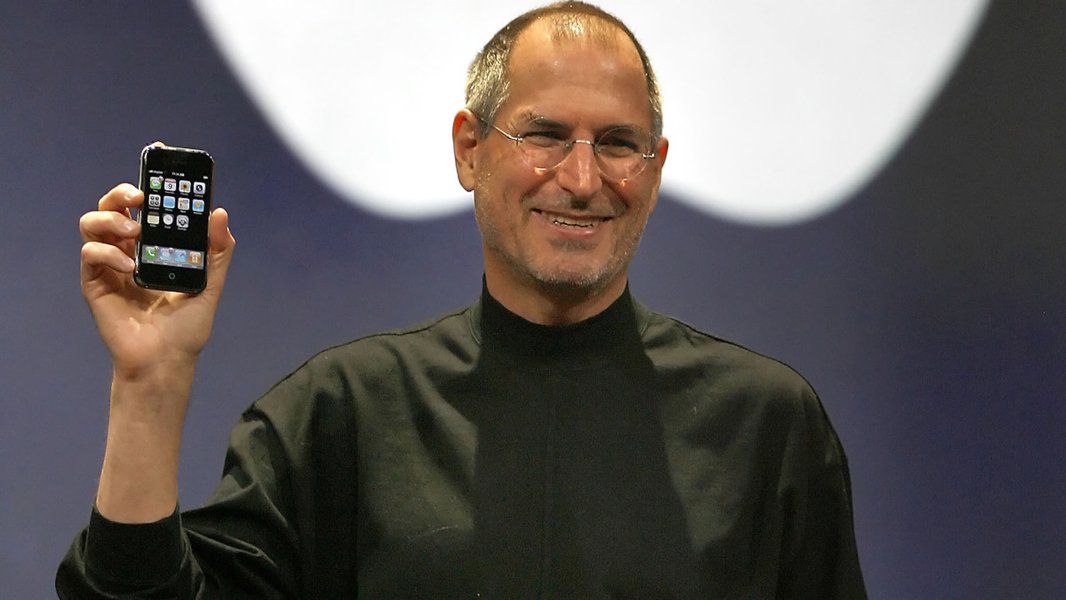 Steve Jobs demonstrating the iPhone's features on stage