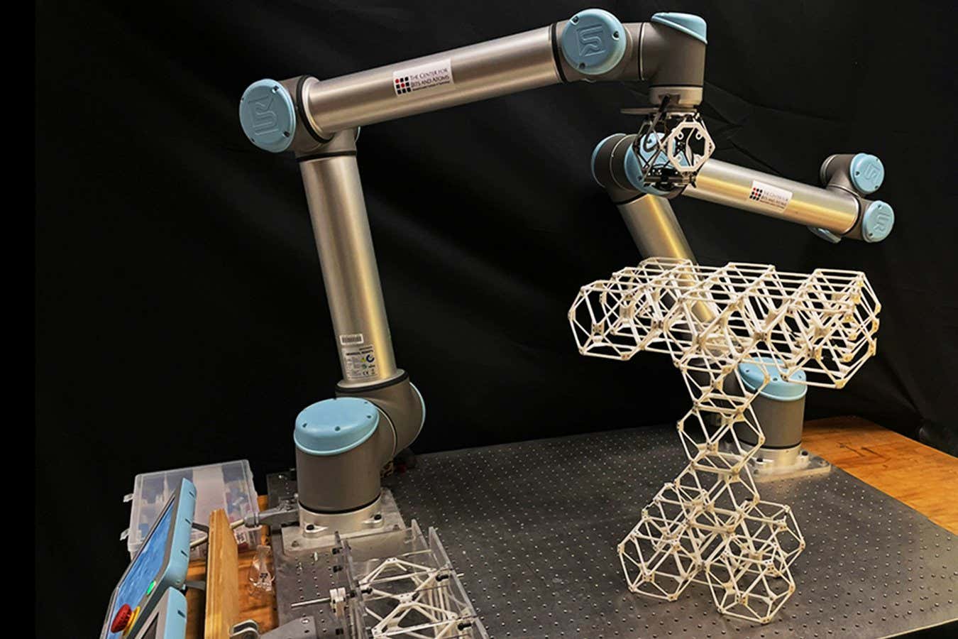 robotic arm assembling blocks