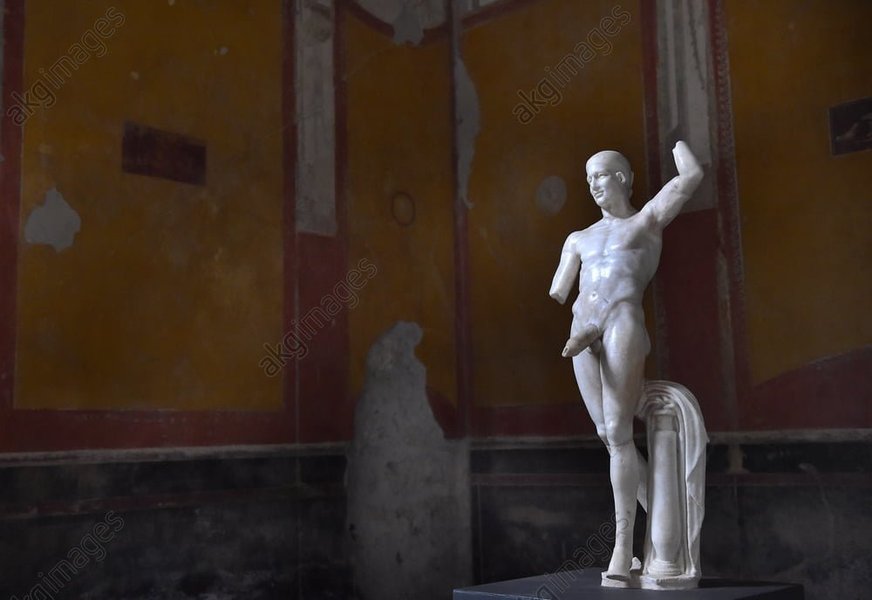 ancient statue with erect phallus