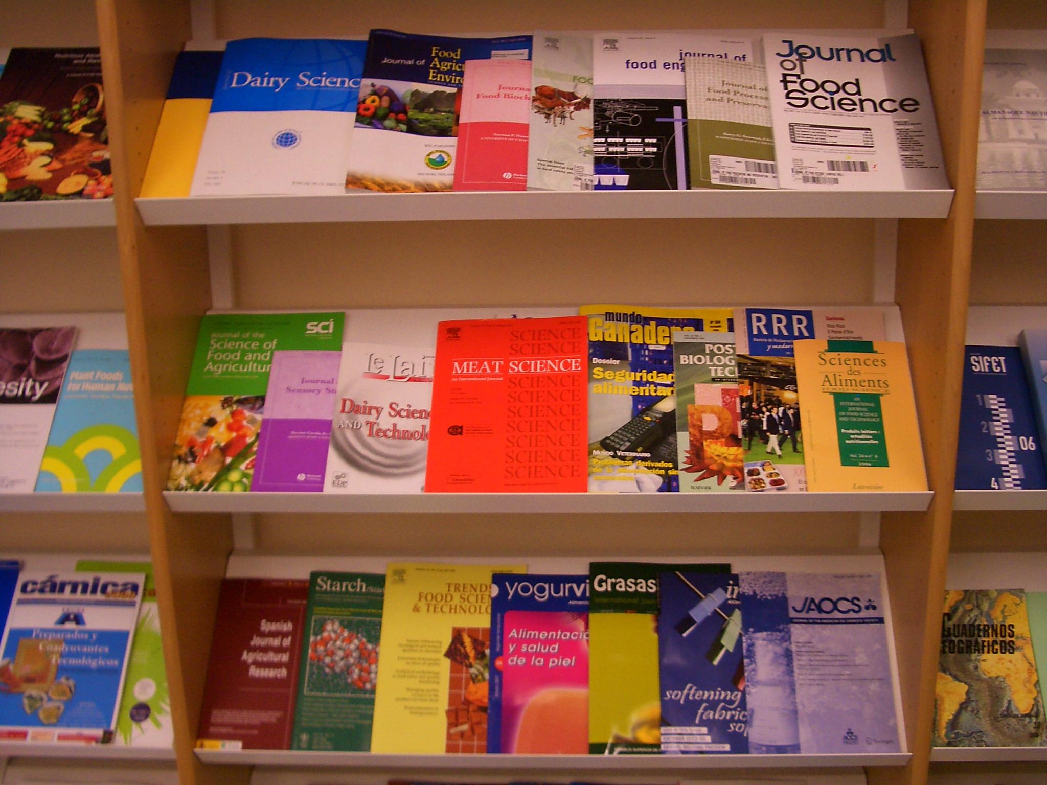 academic journals on library shelf