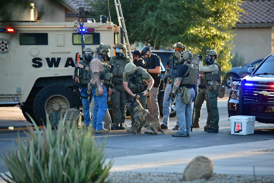 SWAT team with rifles drawn during an operation