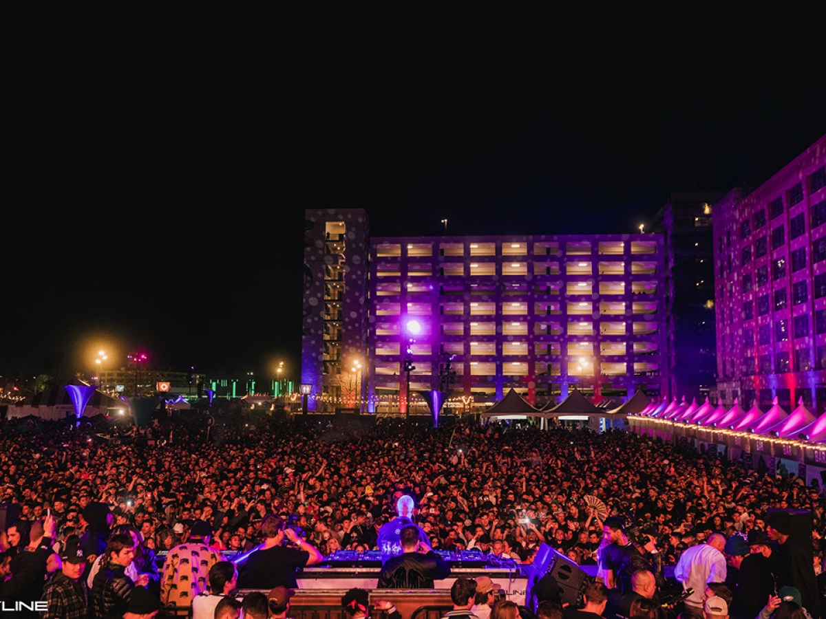 Los Angeles cityscape with musical festival energy