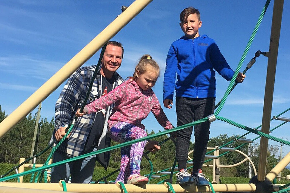 scenic outdoor playground with children playing