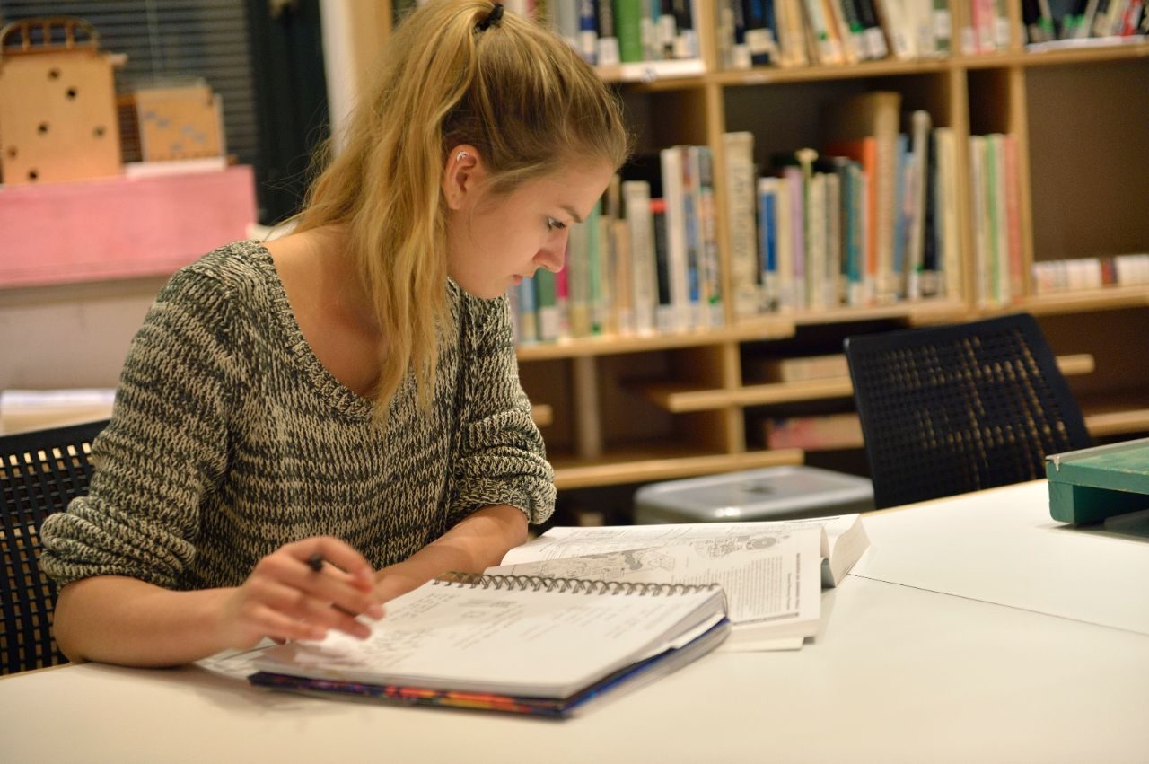 physical library desk writing