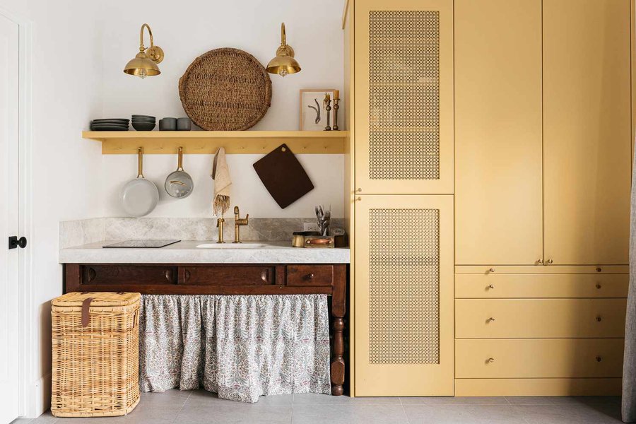 Kitchen with open shelving displaying dishes and decor