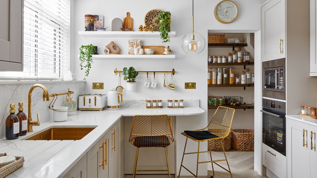 Compact kitchen with creative wall storage solutions