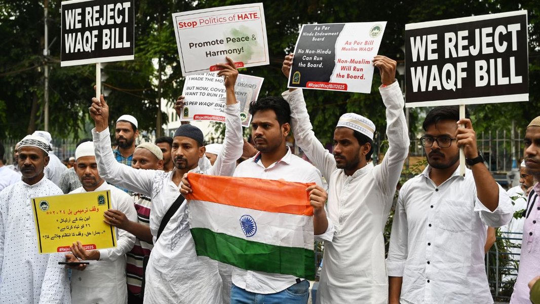 Protesters holding placards