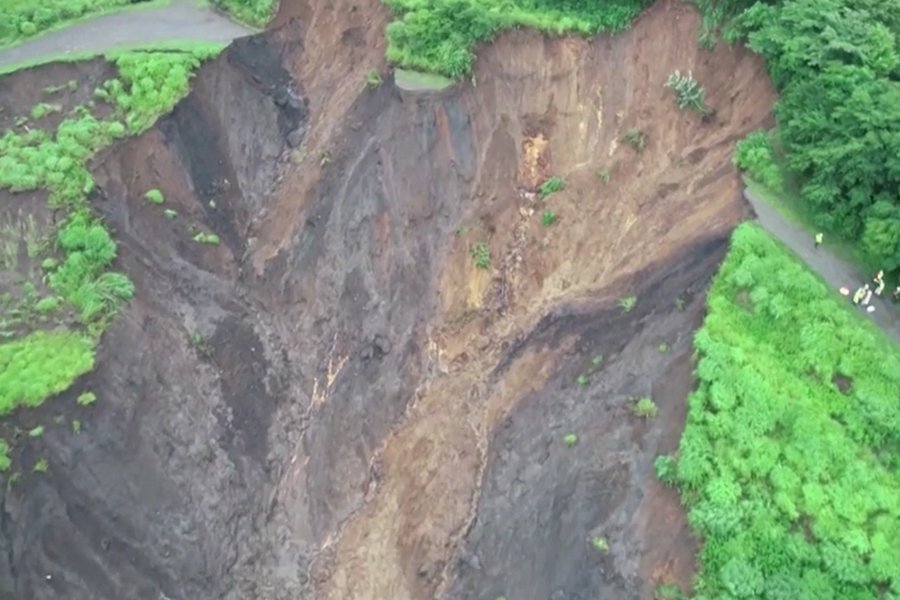Large landslide debris flow through a residential area in Atami, Japan