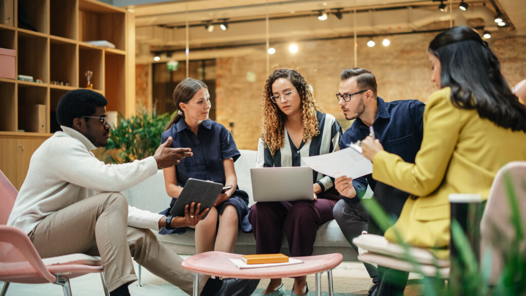 diverse team meeting leadership office