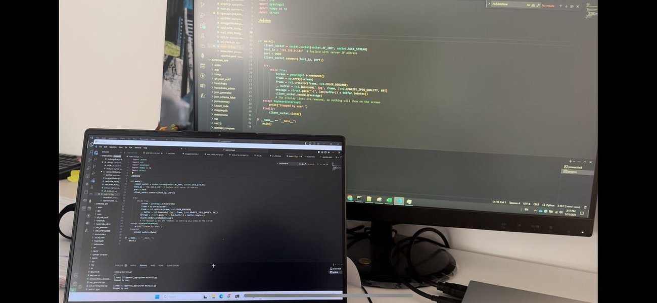 Python code displayed on a computer screen with a blurred background of an office