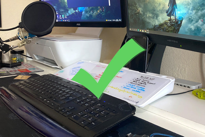 computer workstation with whiteboard and code