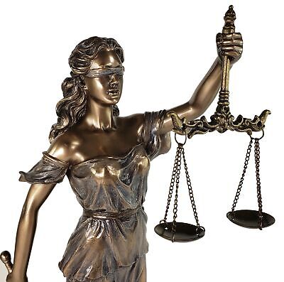 scales of justice on office desk