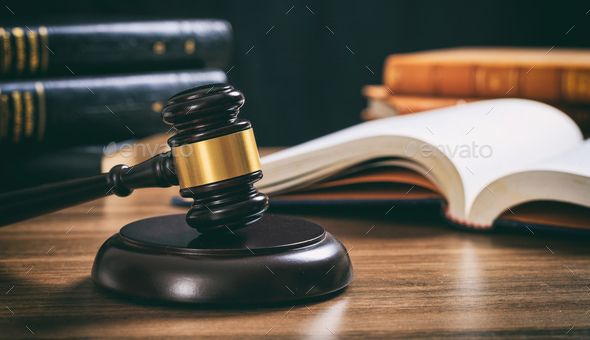 law books on a wooden desk