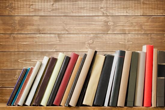 books on old wood shelf