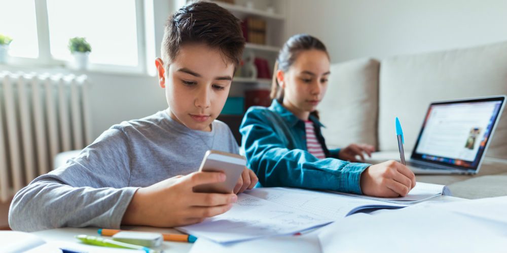 students studying with mobile devices