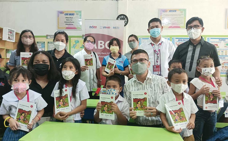 Distribution of reading materials, emphasizing the importance of accessible books.