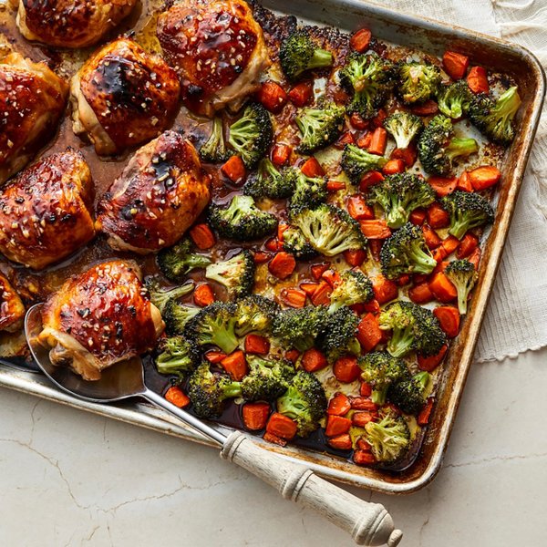 A healthy meal of honey-garlic chicken thighs with vegetables