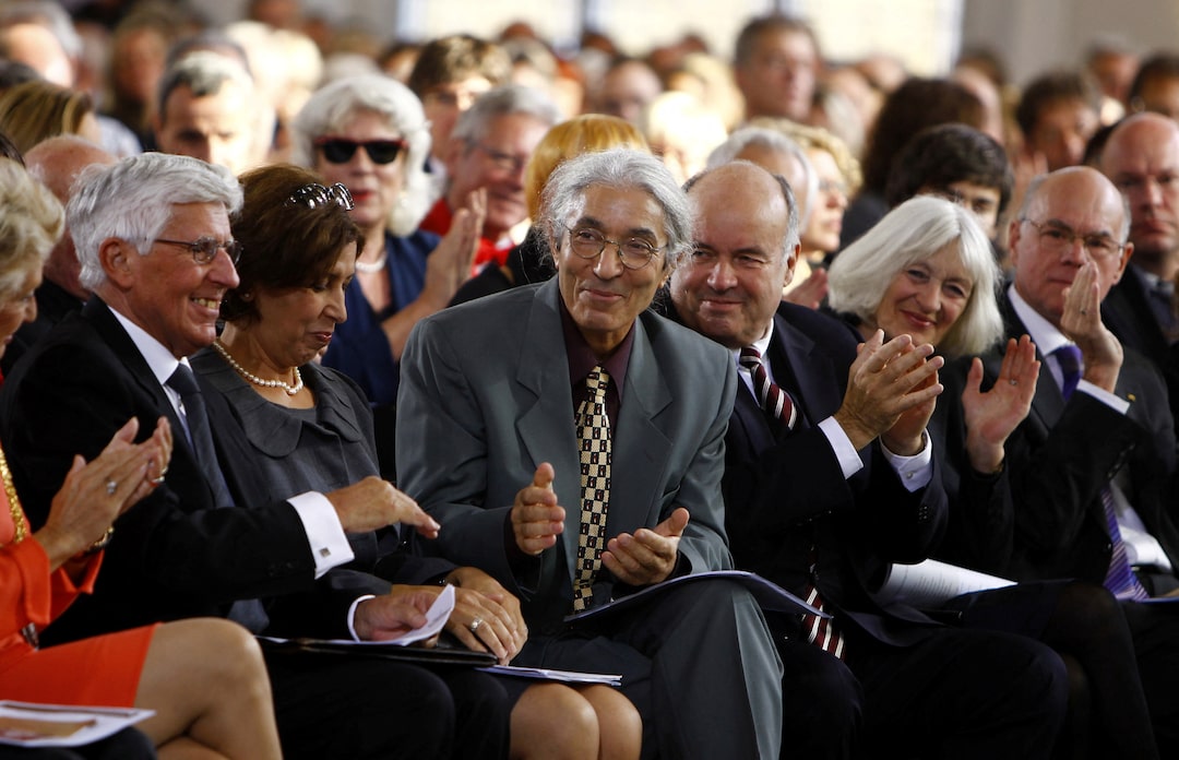 Algerian legal books and business meeting