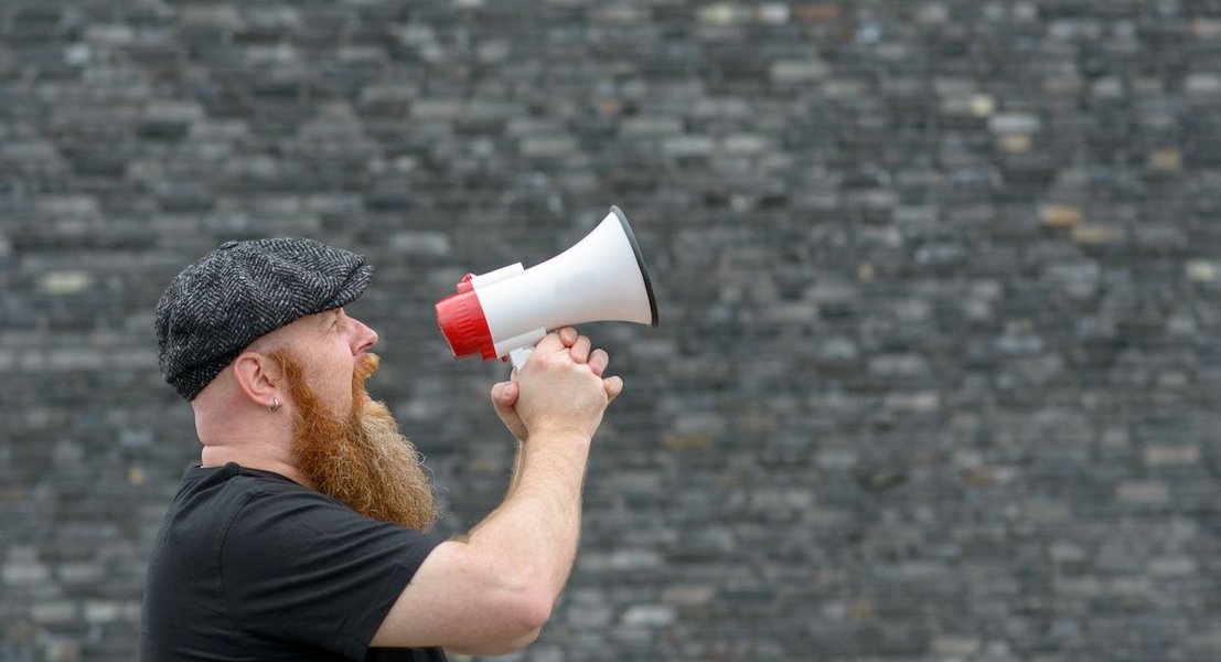 Person yelling, representing uncontrolled anger