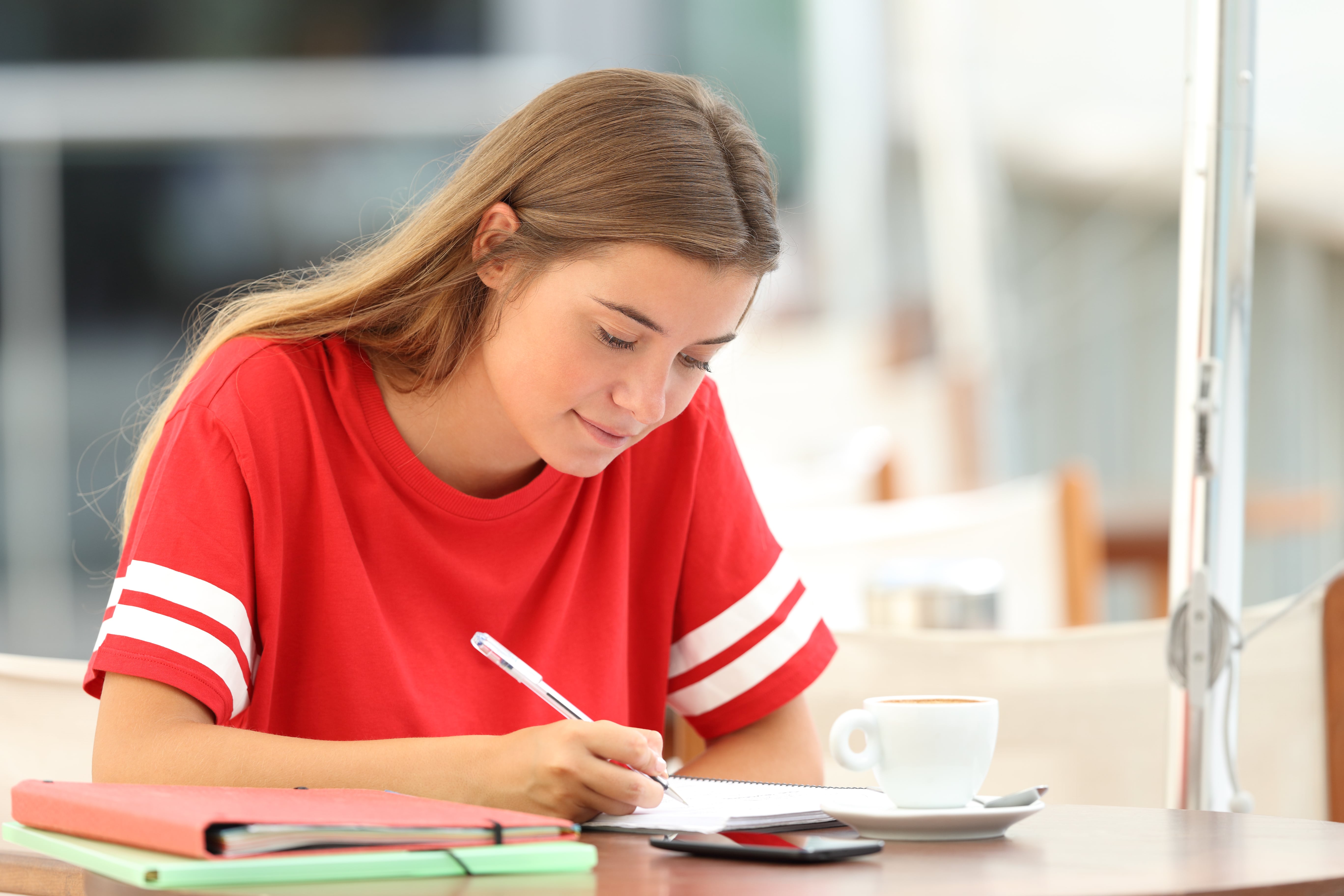 student writing essay