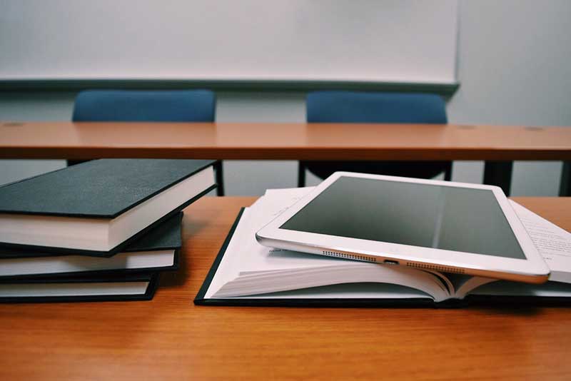 machine learning textbooks on desk