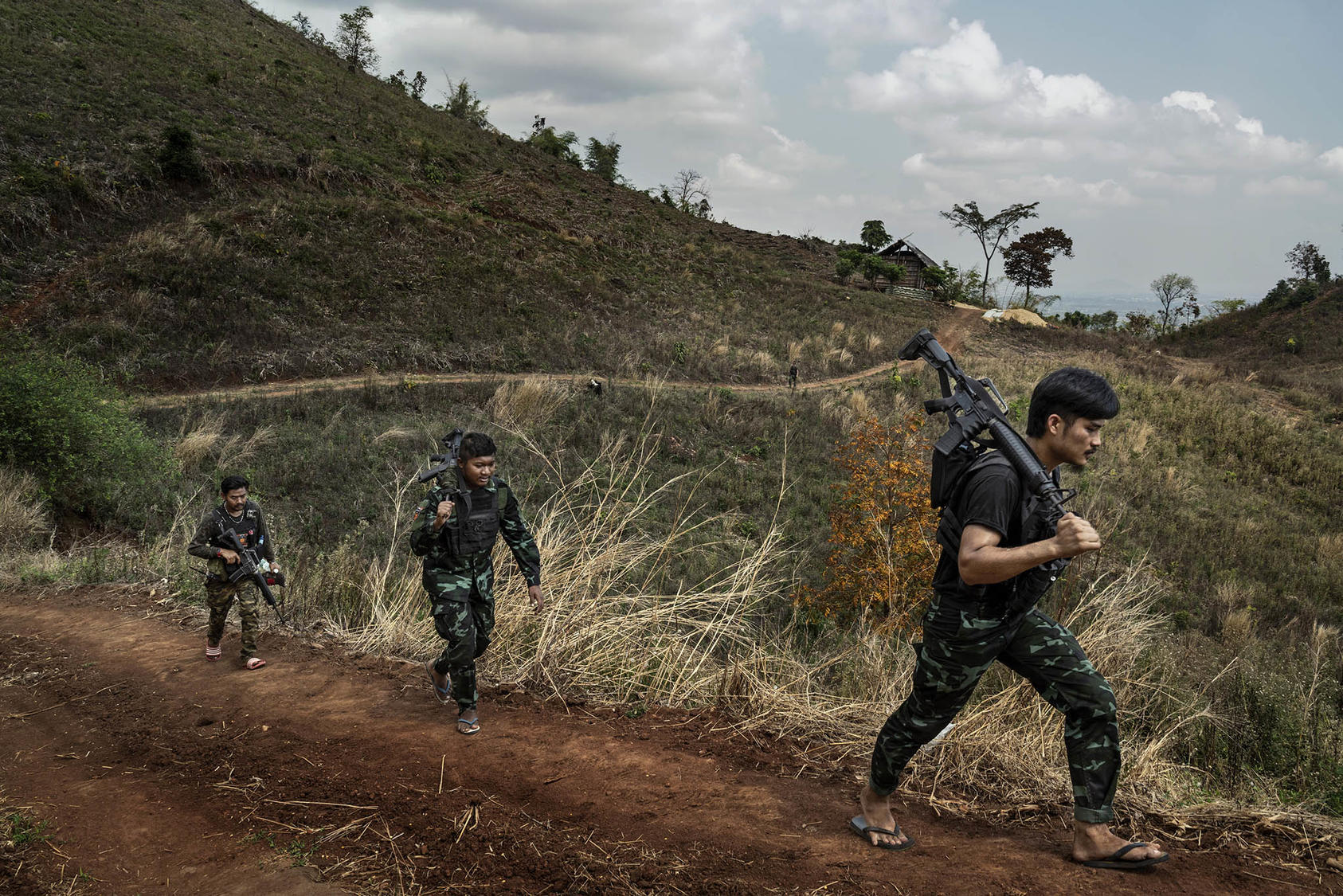dramatic Asian landscape and military equipment