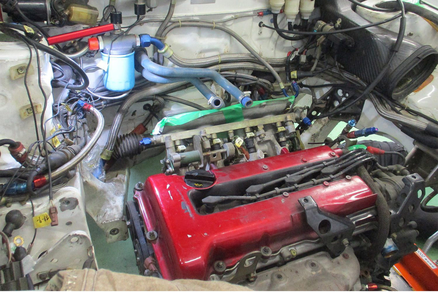 rally car engine compartment damaged