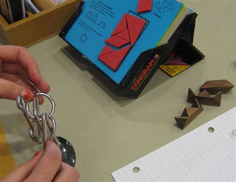 books and puzzles on desk