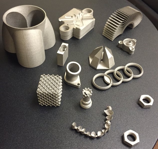 Various small intricate metal 3D printed parts