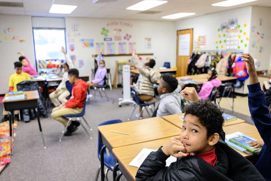 Students participating in a music class or performance