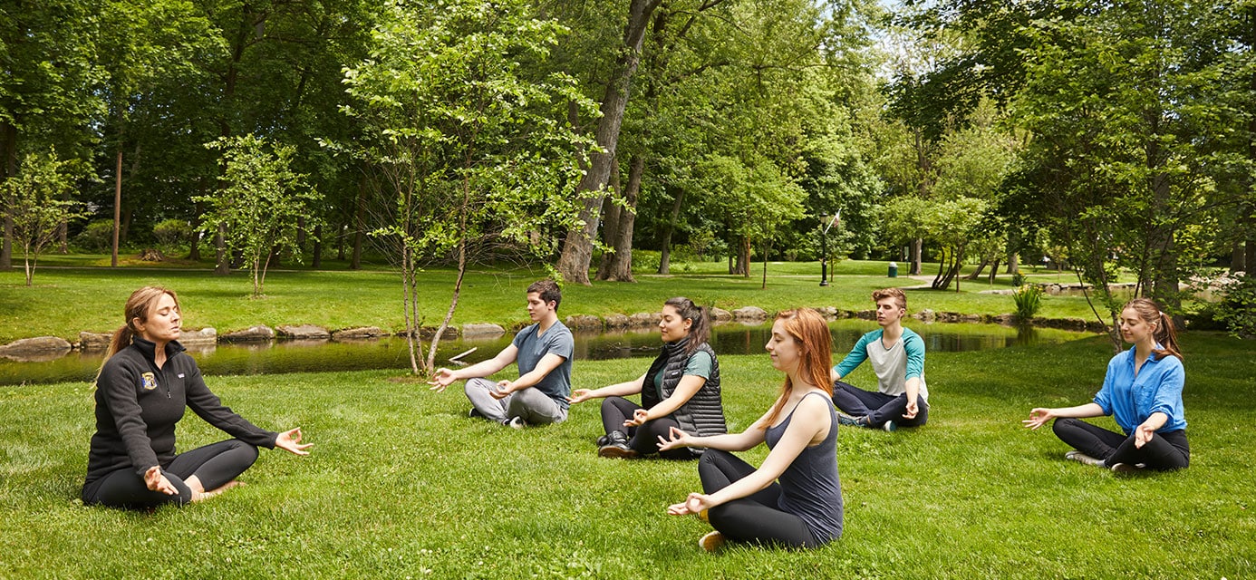 teenagers practicing mindfulness in nature