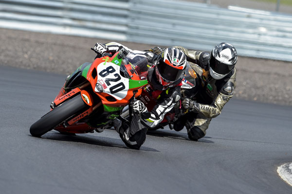 motorcycle rider on track