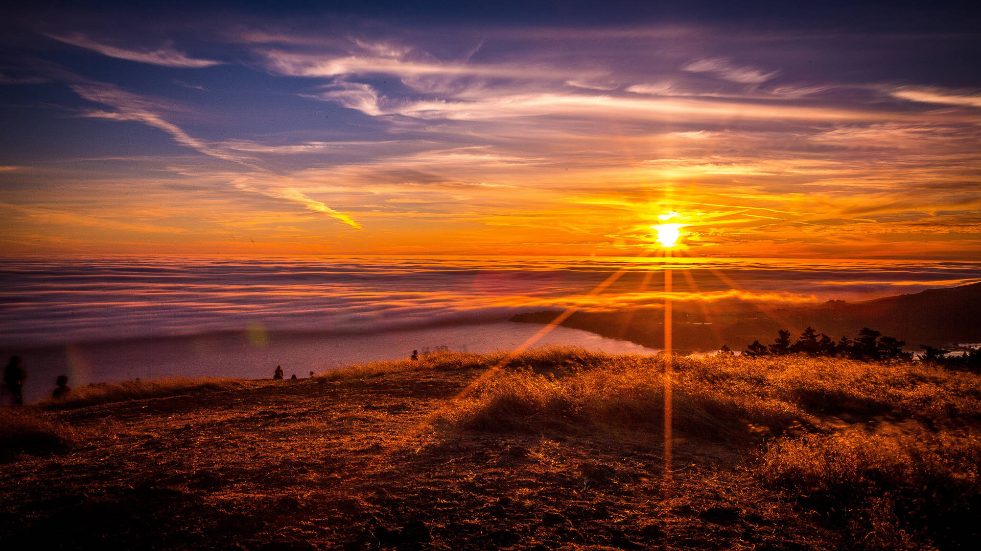 mountain peak sunlight horizon
