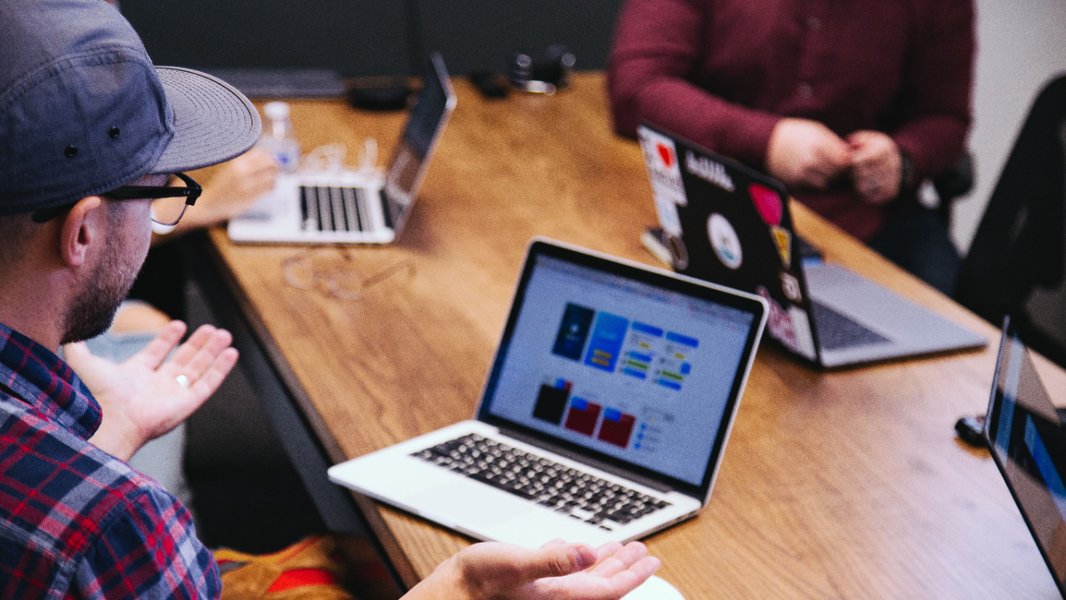 Image representing a team working together on a music project