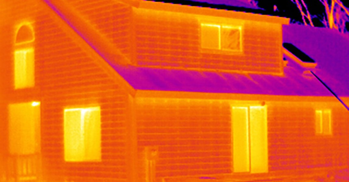 Industrial building with thermal imaging inspection overlay.