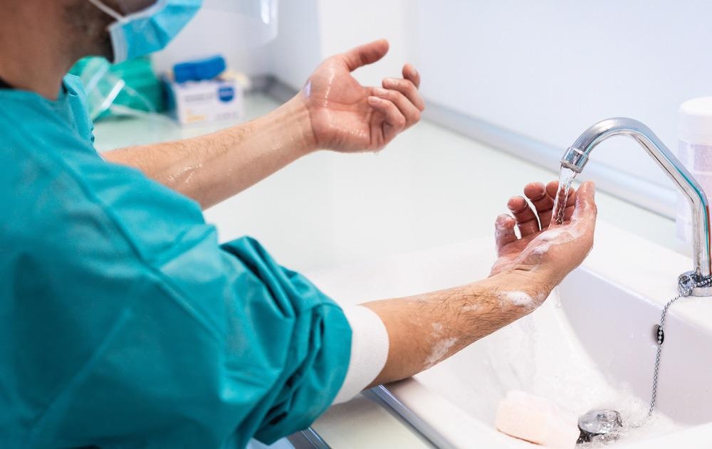 hospital ward nurse practicing hygiene