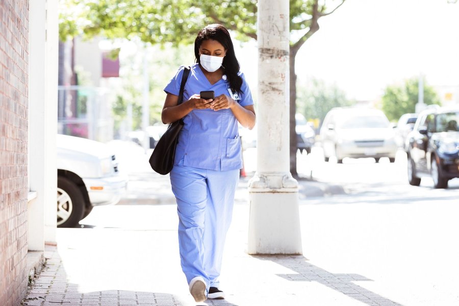 nurse stepping out car