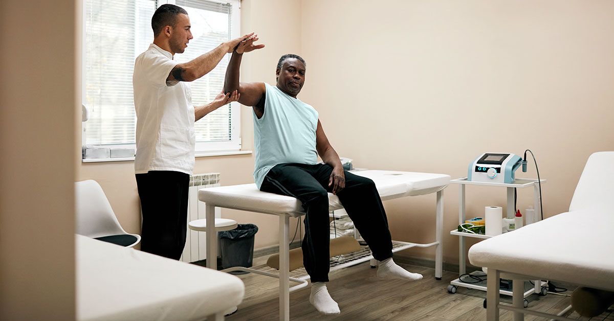 physical therapy session with patient in hospital room