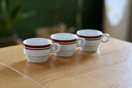 vintage ceramic coffee cups on display