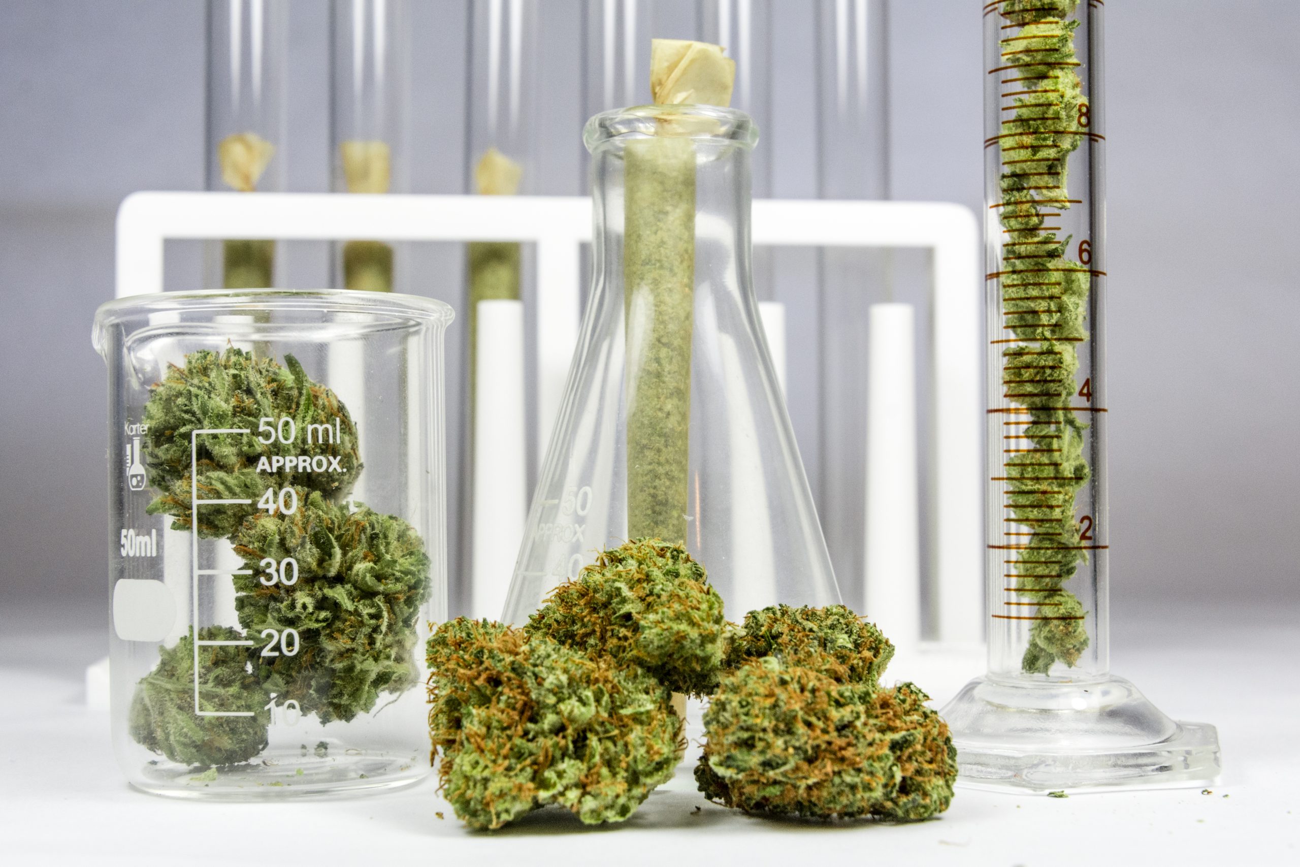 cannabinoid lab equipment, chemical reaction images, physical product packaging of cannabinoids