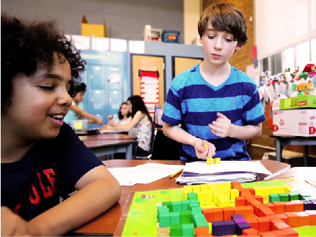 students playing educational games in classroom