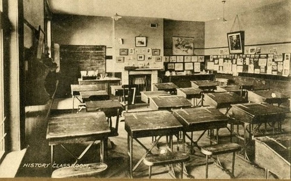 An old classroom setting, possibly a grammar school history classroom.